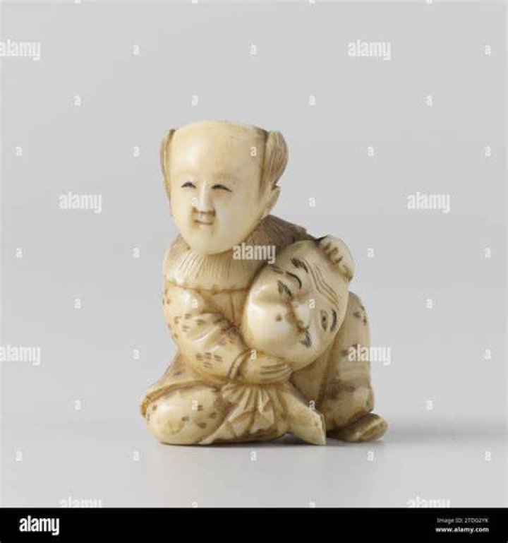 Why do netsuke have holes?